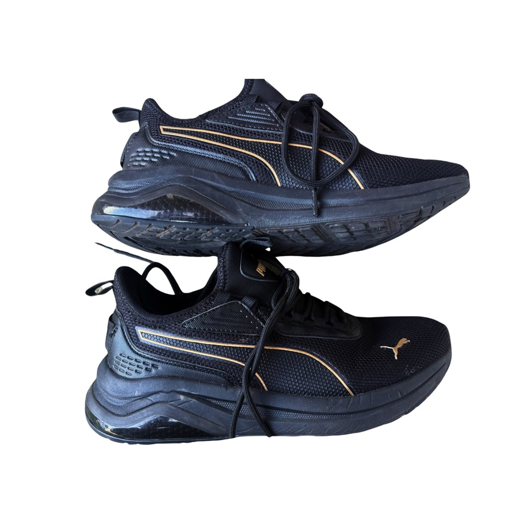 Puma Amplifier running / training Shoe Black & Gold woman’s size  9